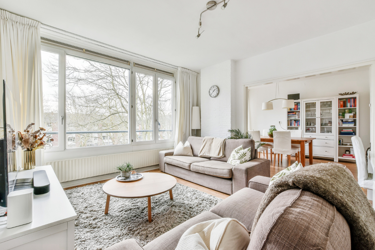 Cozy modern farmhouse living room with rustic decor.