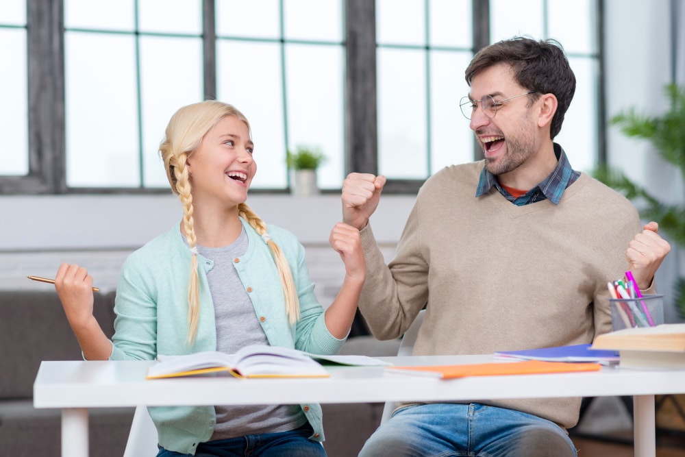 Two friends having fun together at class