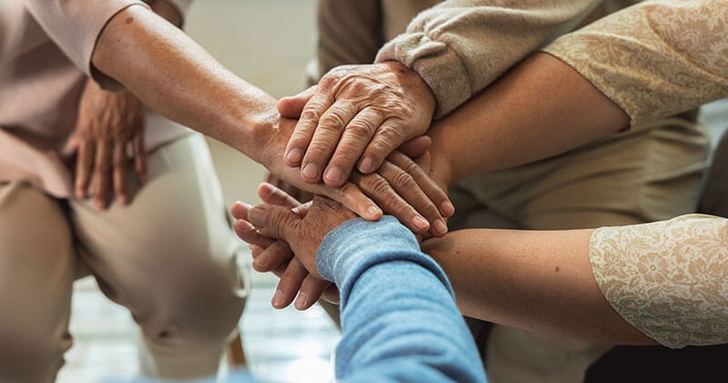 People coming together through unity and shared purpose.