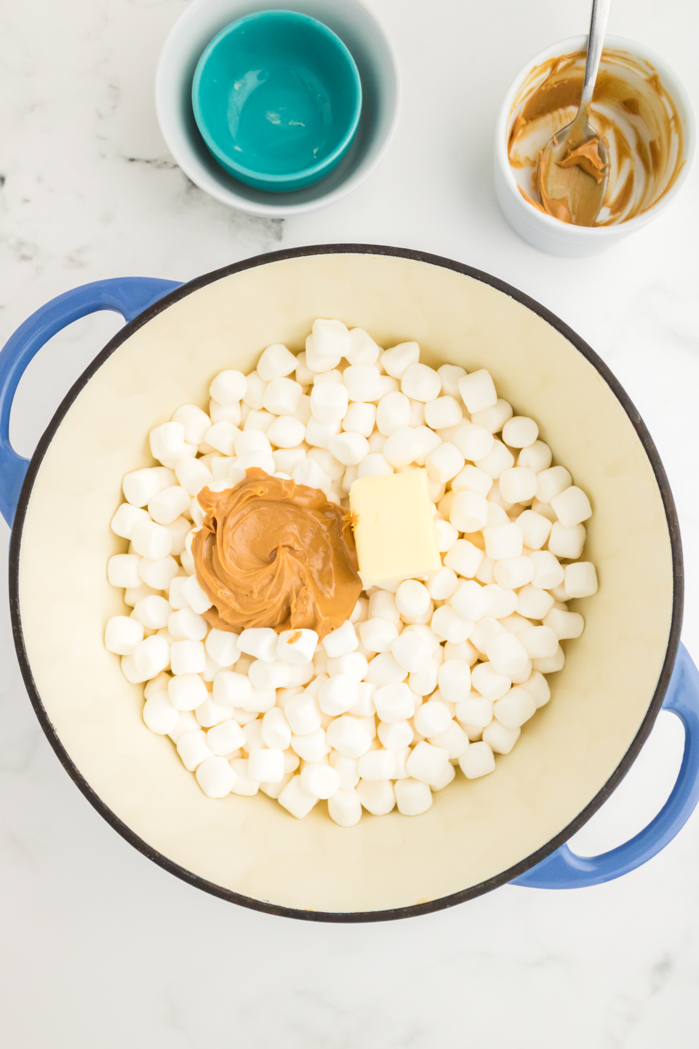 marshmallows, peanut butter, and butter in large saucepan