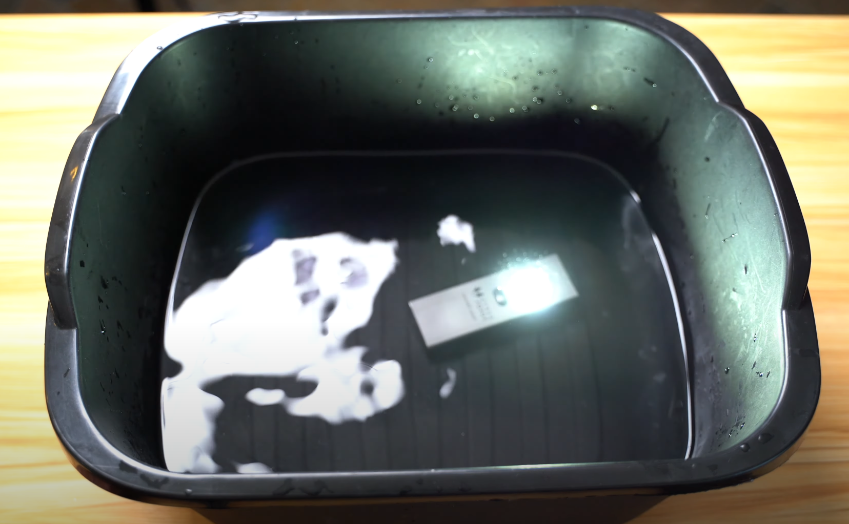 cybertools flashlight submerged in water