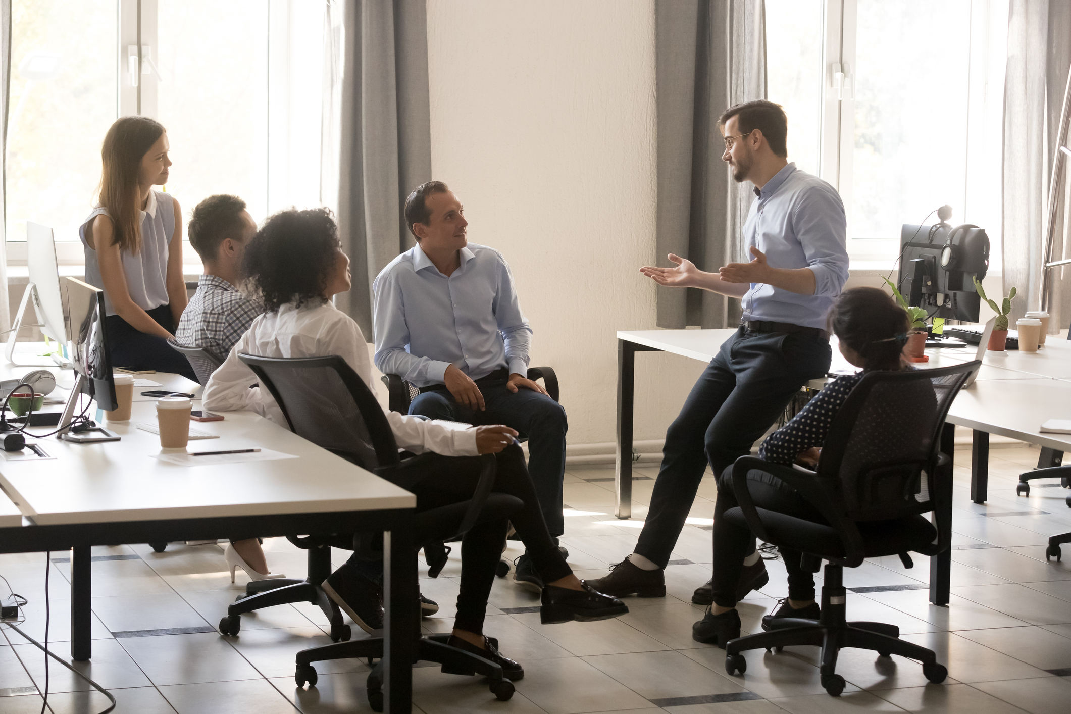 A group of people discussing leadership skills