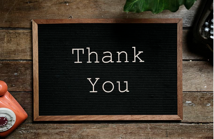 alt="A bulletin board with the words Thank You printed on it" 