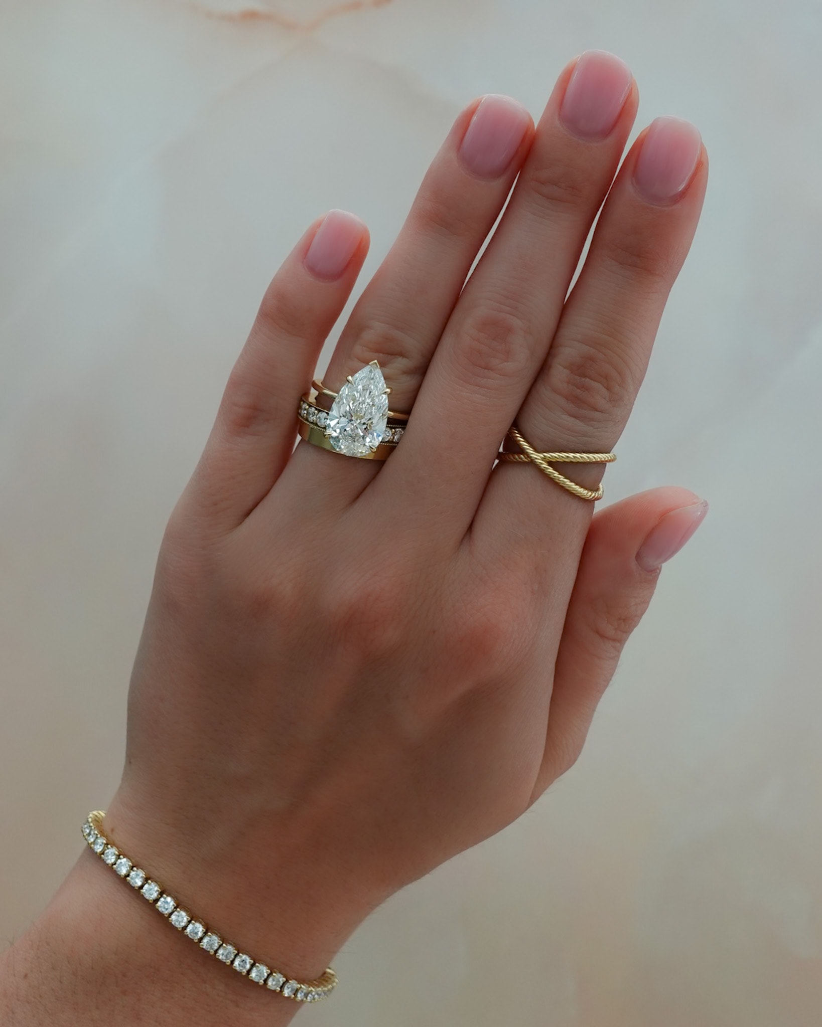 thin+ simple with a pear cut diamond