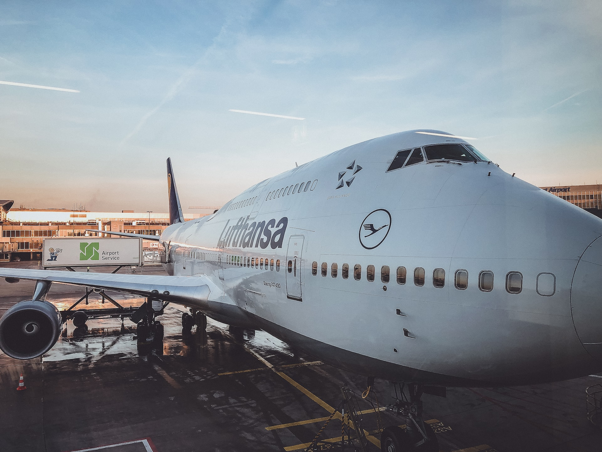A Lufthansa aircraft being loaded before a flight. 