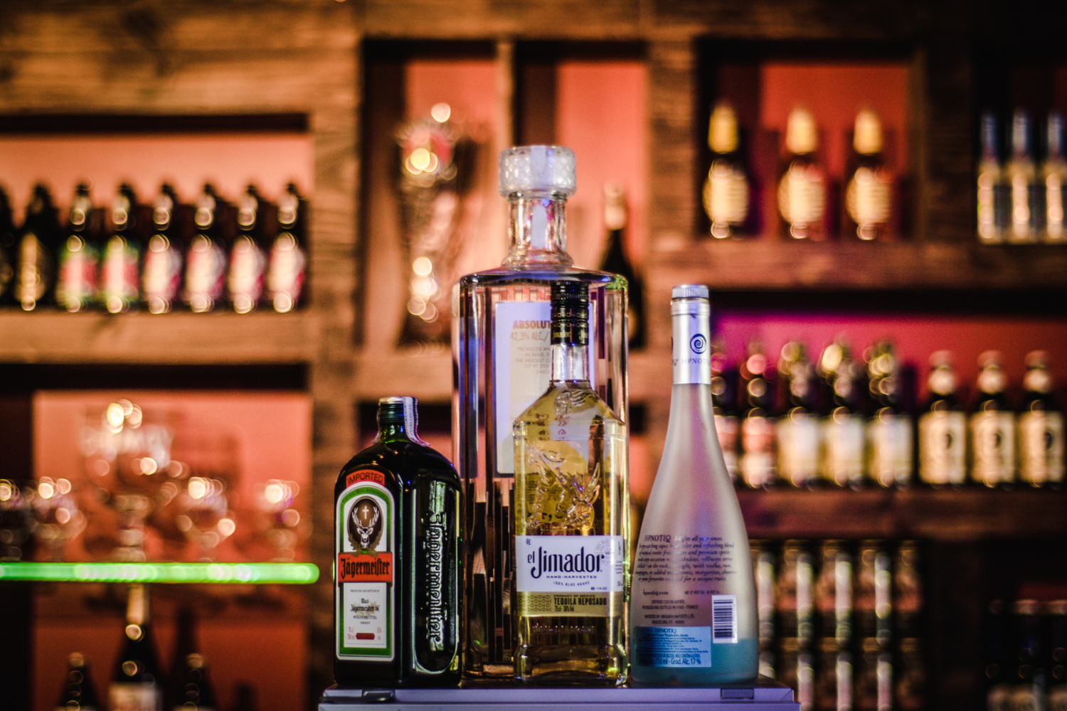Different types of branded alcohol on display.
