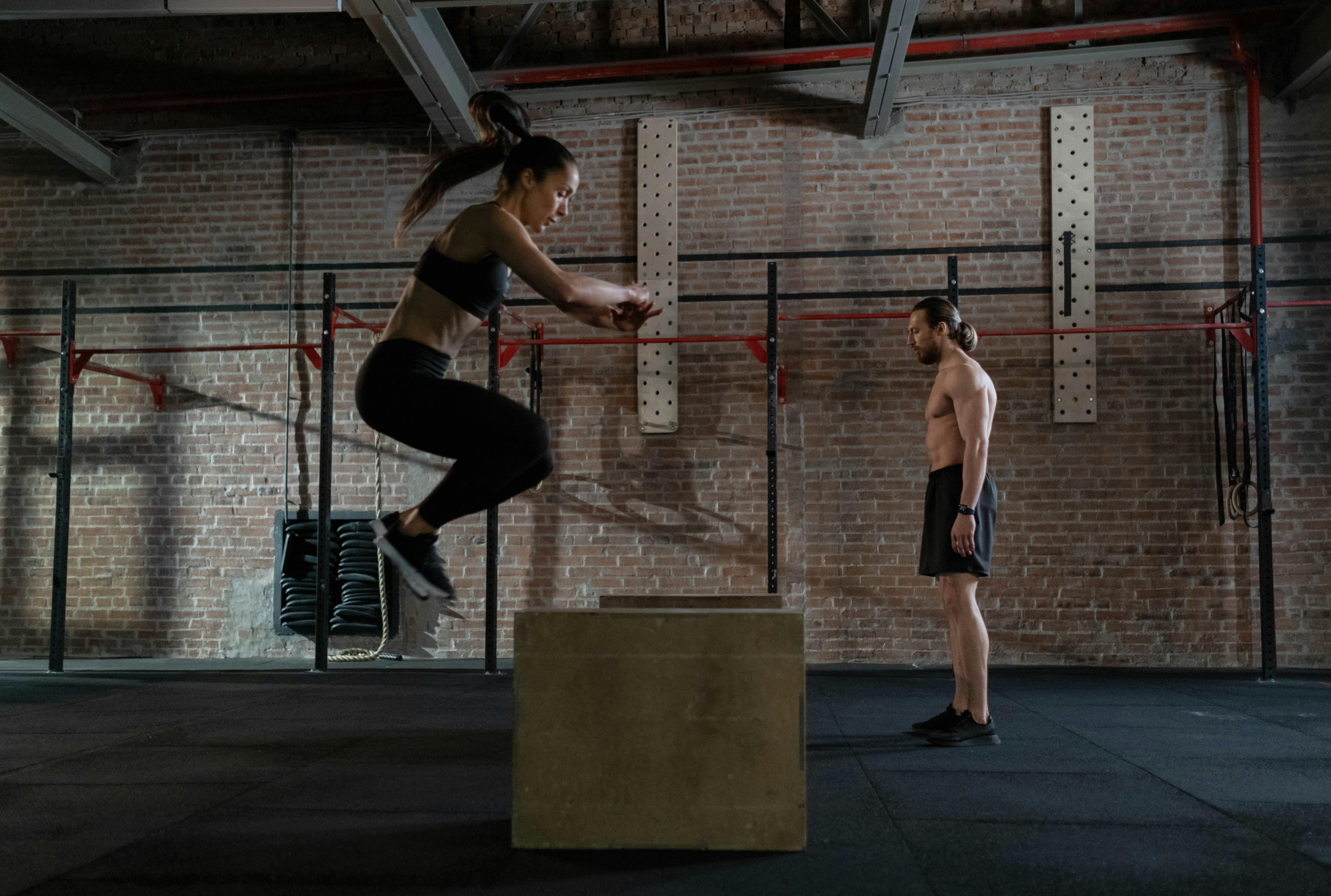 Photo by cottonbro studio: https://www.pexels.com/photo/man-and-woman-practicing-plyometrics-7688862/