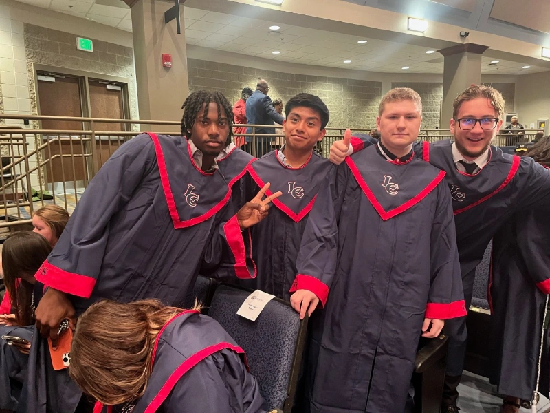 students in graduation robes