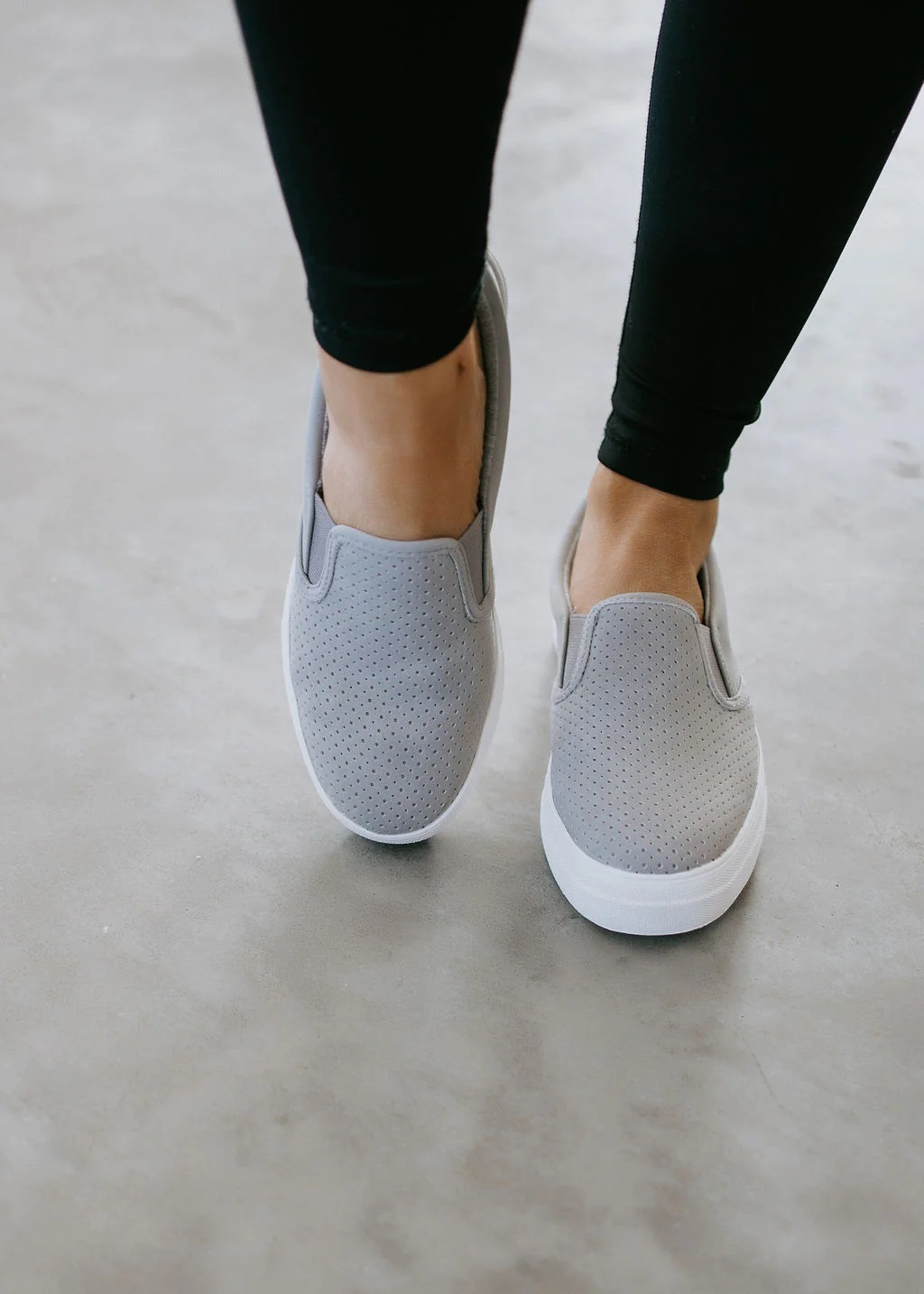 Slip-on sneakers with leggings