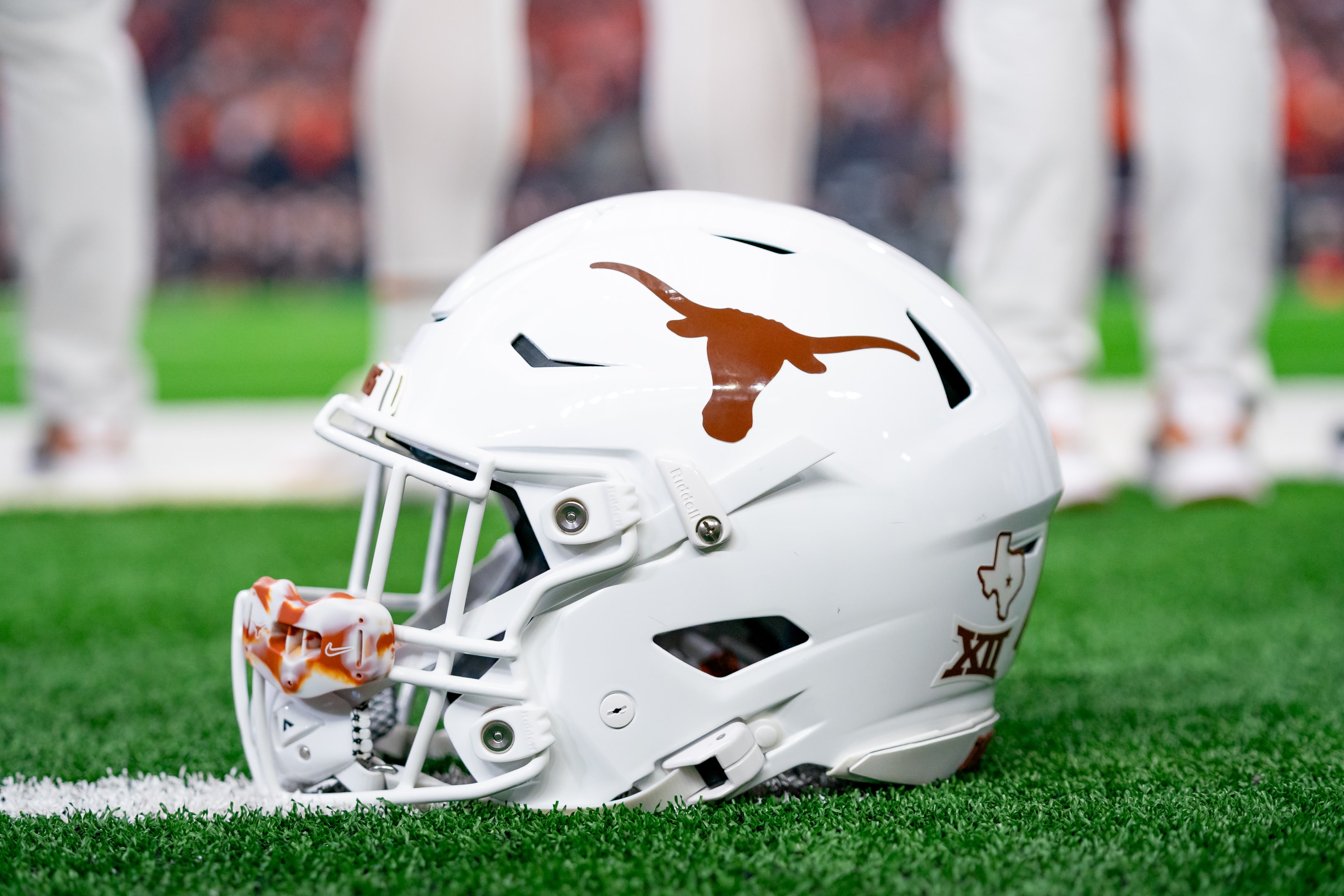 Texas Longhorns helmet sits on the sidelines during the Big 12 Championship game between the Texas Longhorns and the Oklahoma State Cowboys on December 02, 2023 at AT&T Stadium in Arlington, TX.