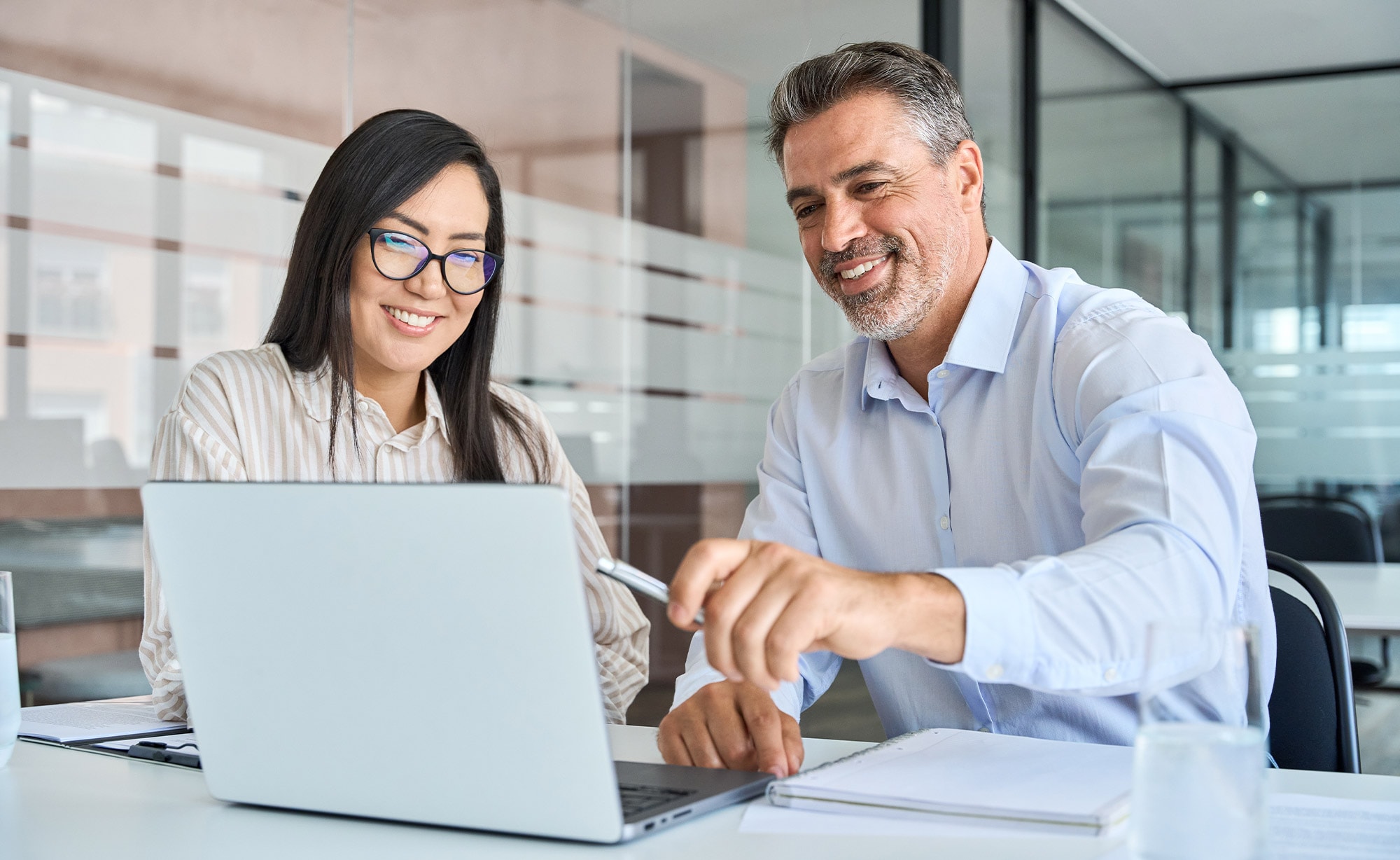 Clients comparing options on their laptop