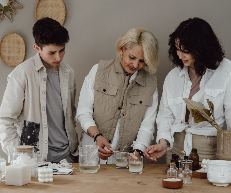 a family makes candles together