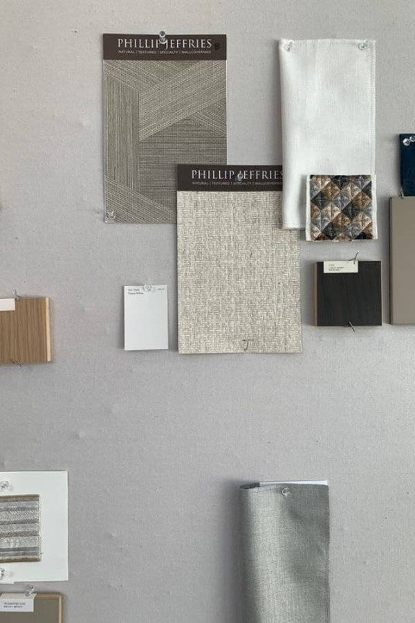 Phillip Jeffries wallcoverings pinned to a mood board