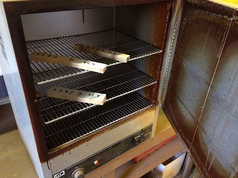 Oven dry testing process for measuring wood moisture content