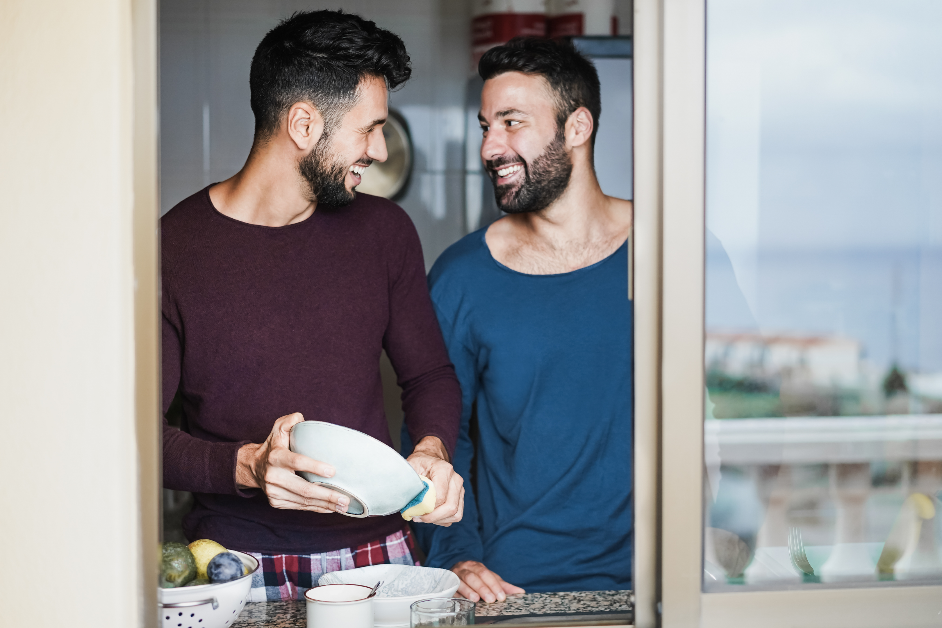 Gay couple in New York City successfully navigating an open relationship without committing adultery or infidelity, thanks to guidance from Loving at Your Best Marriage and Couples Counseling.