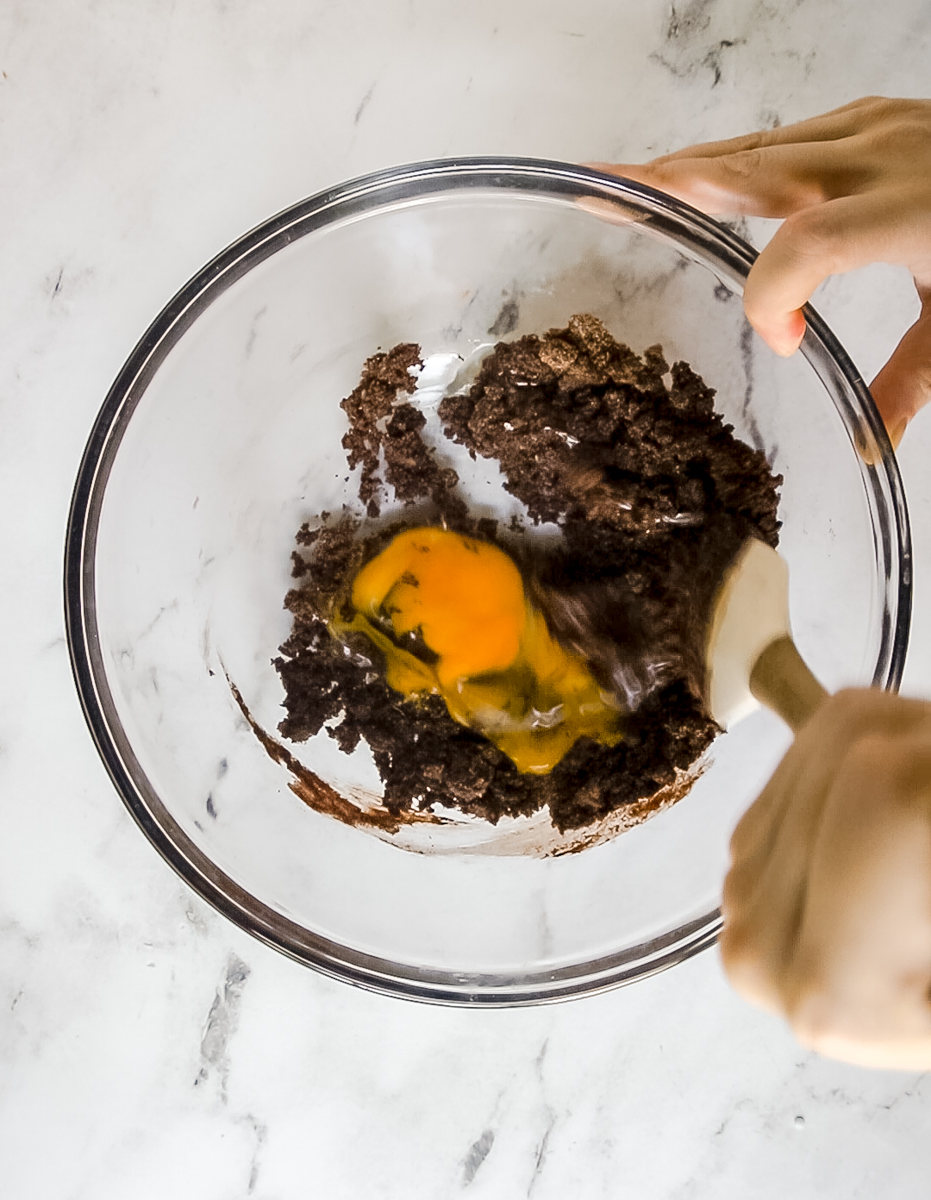 egg added to chocolate cookie dough