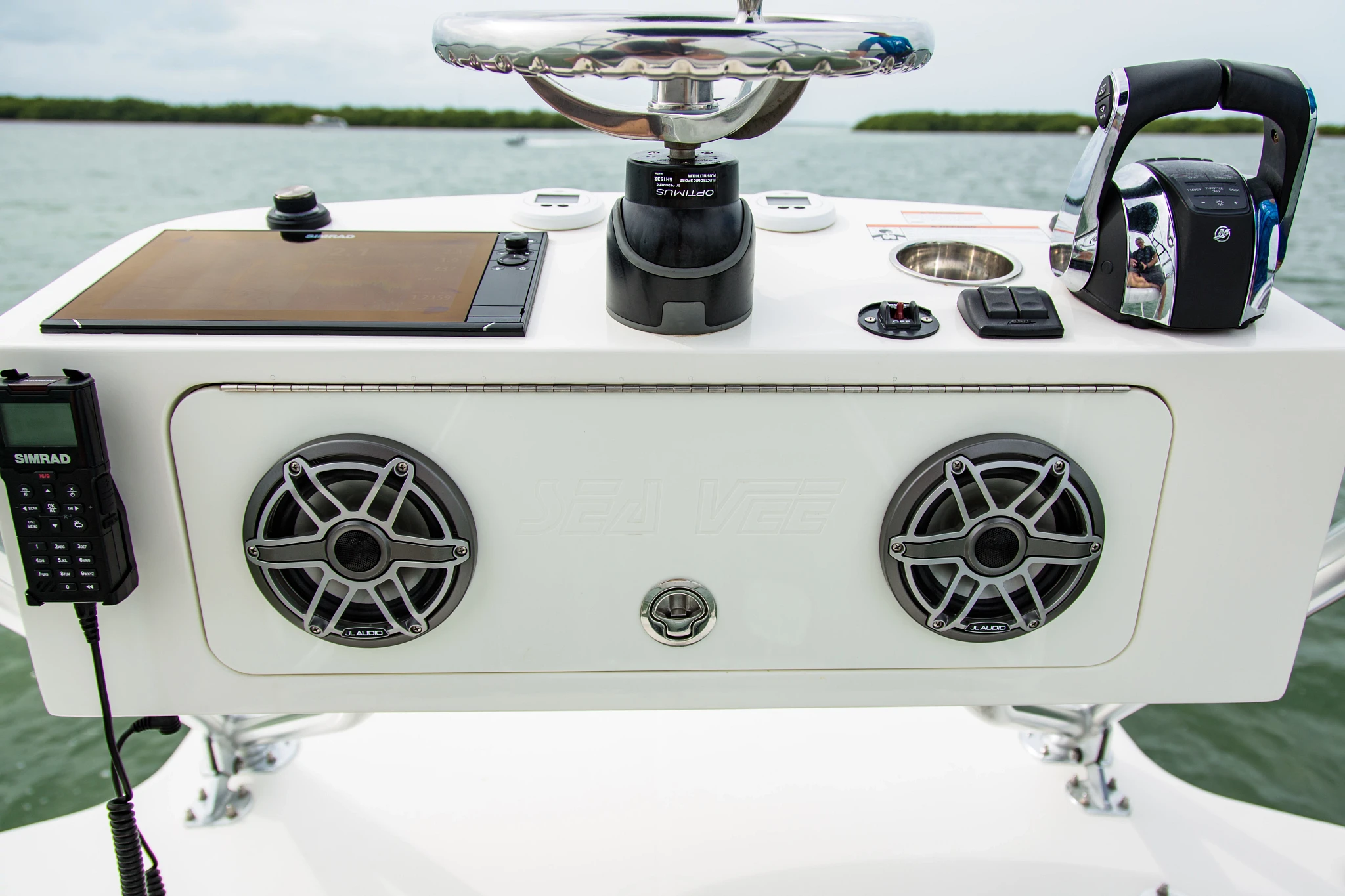 A pair of flush mounted speakers installed in a boat, providing high quality sound for the best boating experience