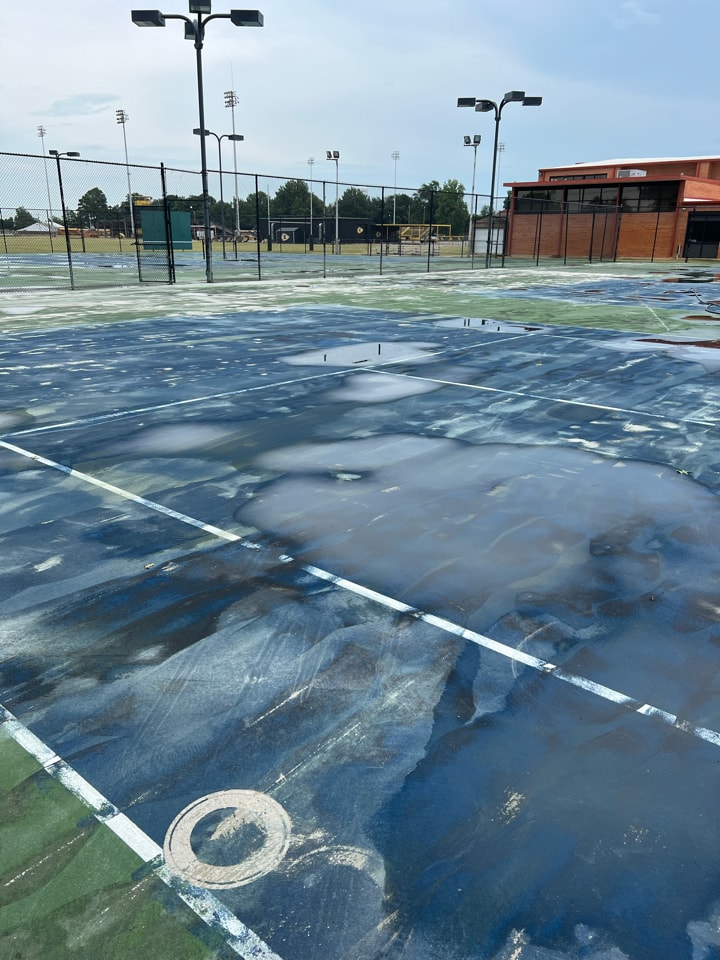 Old Tennis Court that needs resurfacing