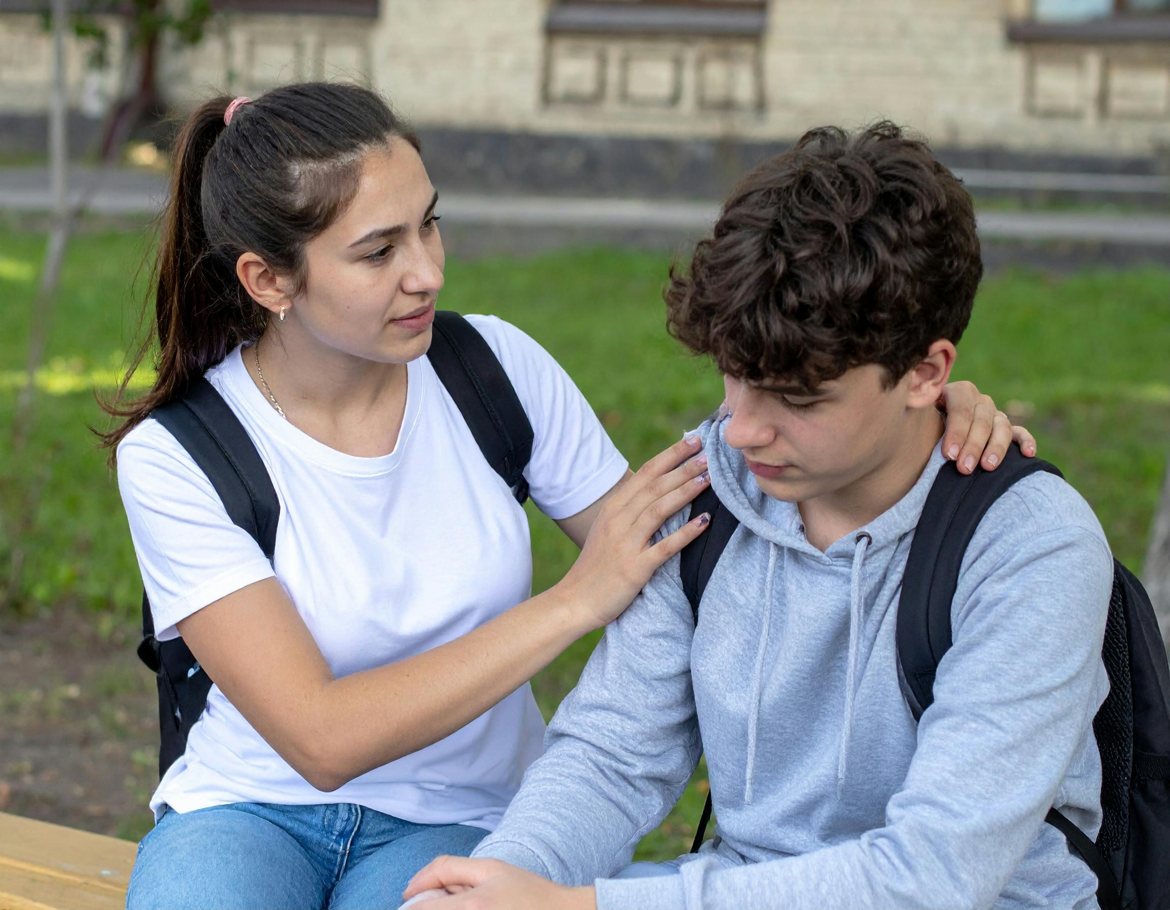 Friends comfort each other, minimizing the stress of mental health issues