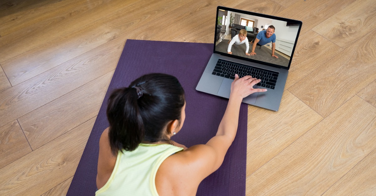 A group of people taking an online fitness class