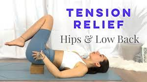 Lower Back Pain And Hip Tension Relief Using A Yoga Block - YouTube