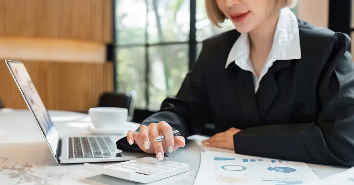 Woman checking currently not collectible status foreign taxpayer financial details.
