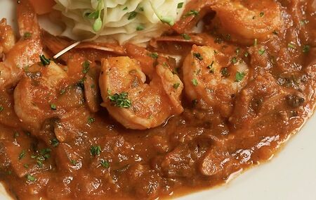 Goat Waterstew in Saint Kitts and Nevis, Cajun tomato cream sauce with grilled scallops and shrimp, Marshall's Restaurant,