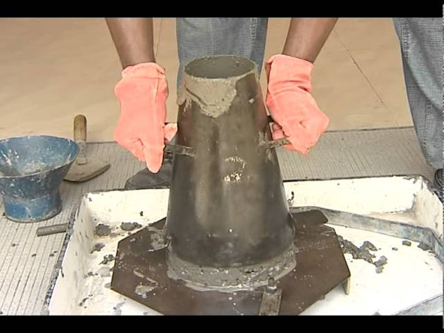 A durable Everest slump cone used for testing the consistency of concrete mix