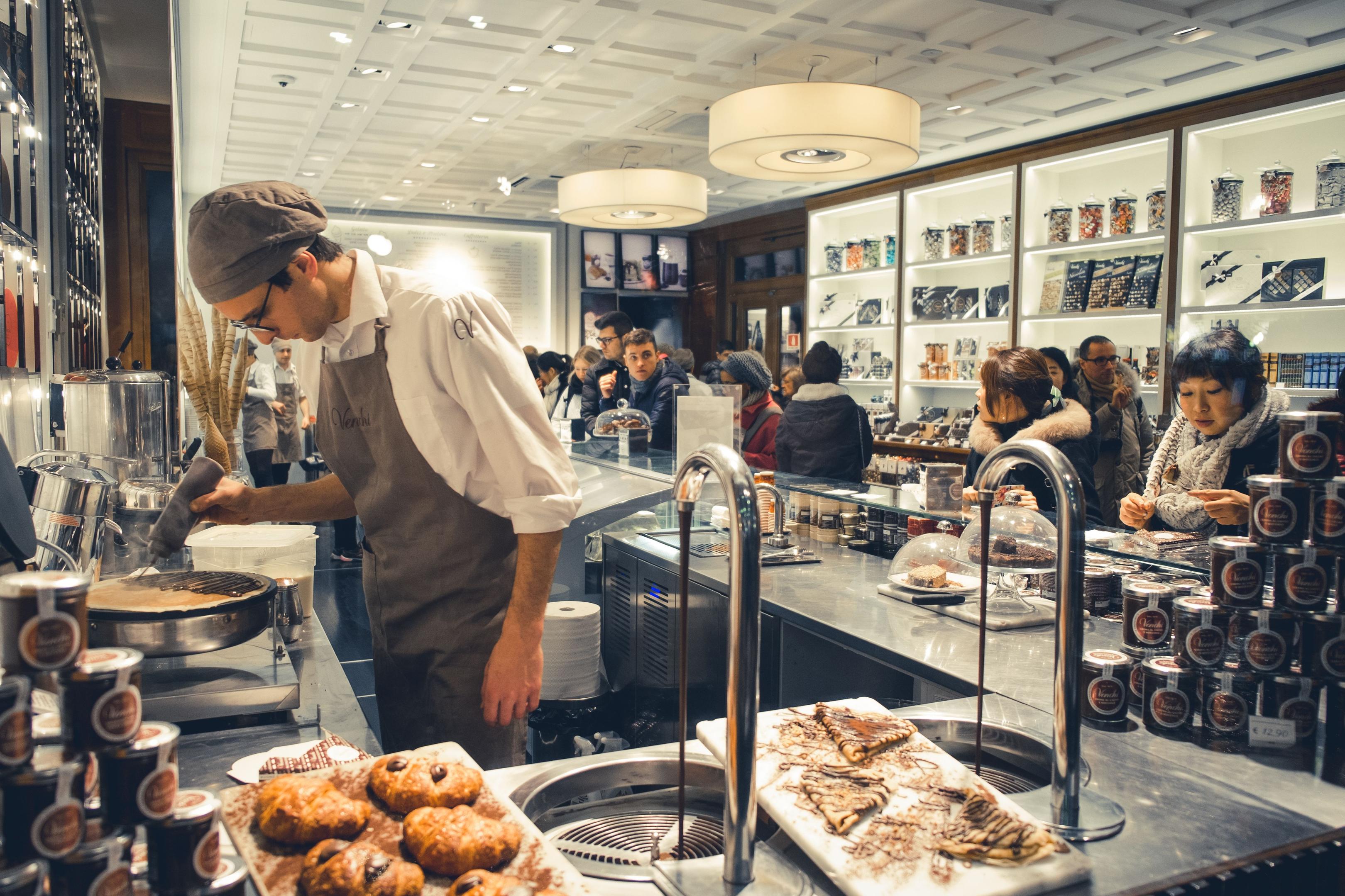 A smartphone screen showcases a mobile-friendly restaurant menu page, featuring clear ordering buttons for a seamless customer experience.
