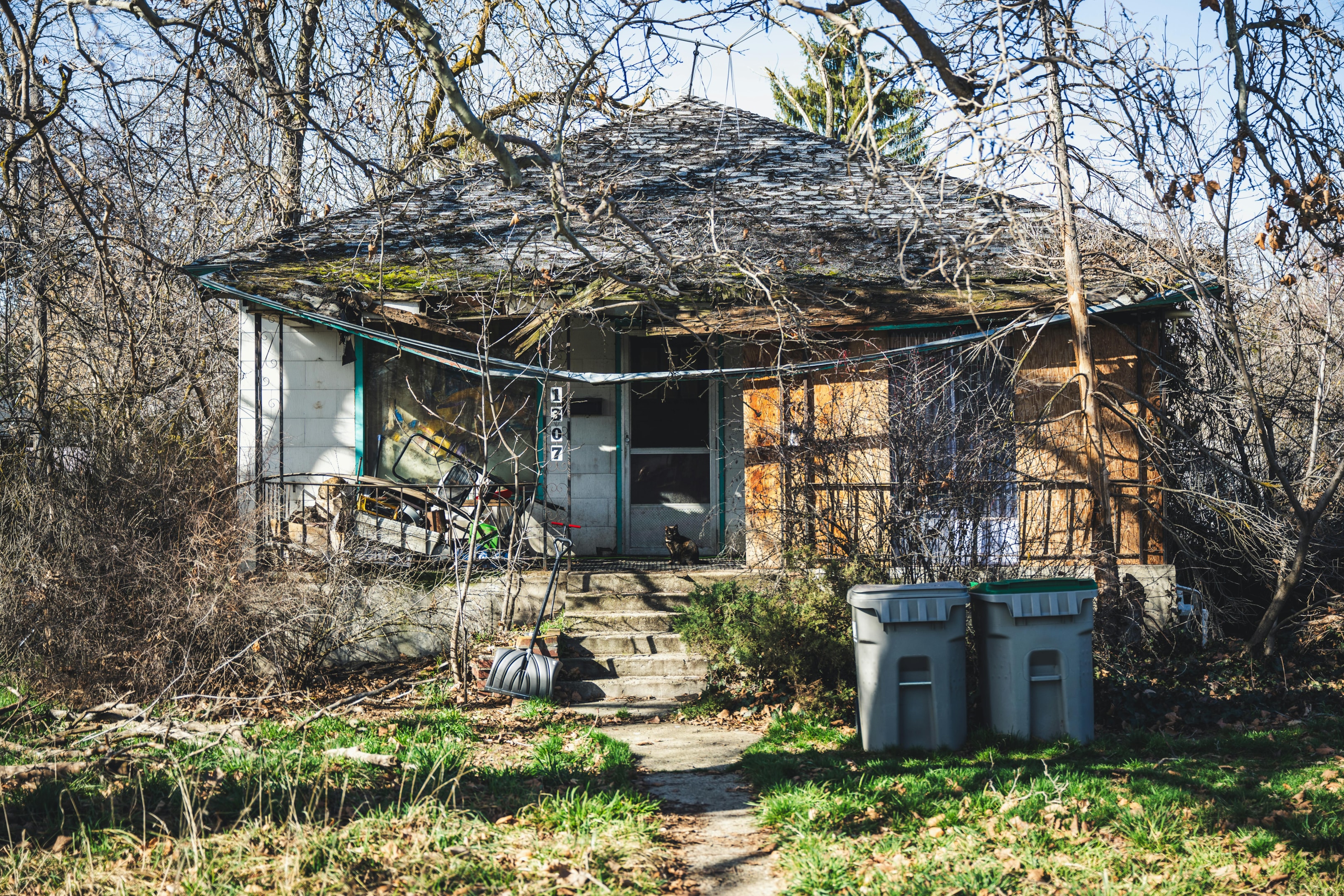 Distressed tax delinquent property purchased by real estate investor for a fix-and-flip project.