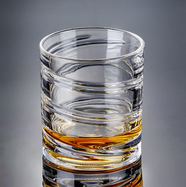 Spinning whiskey glass