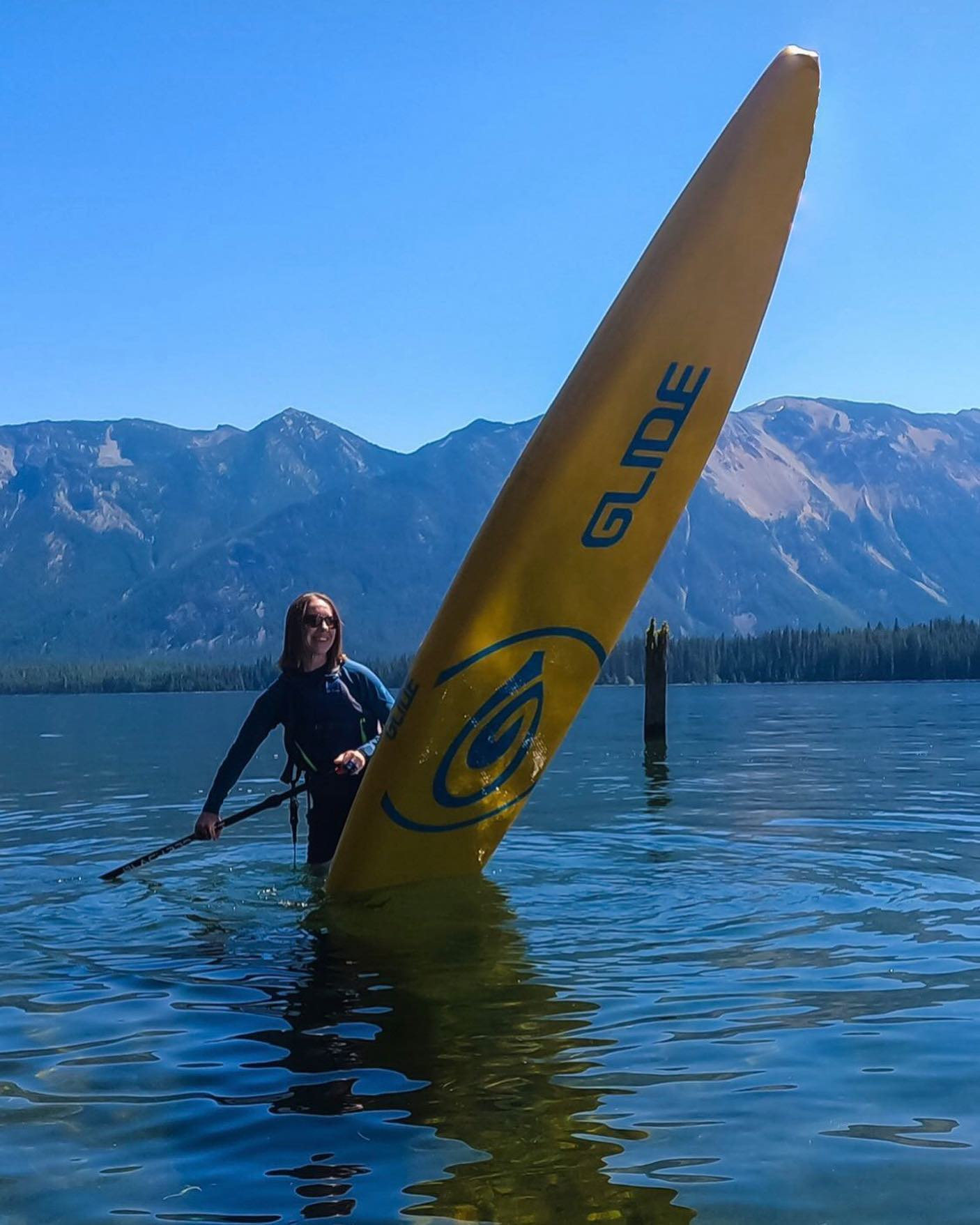 woman on an inflatable paddle board