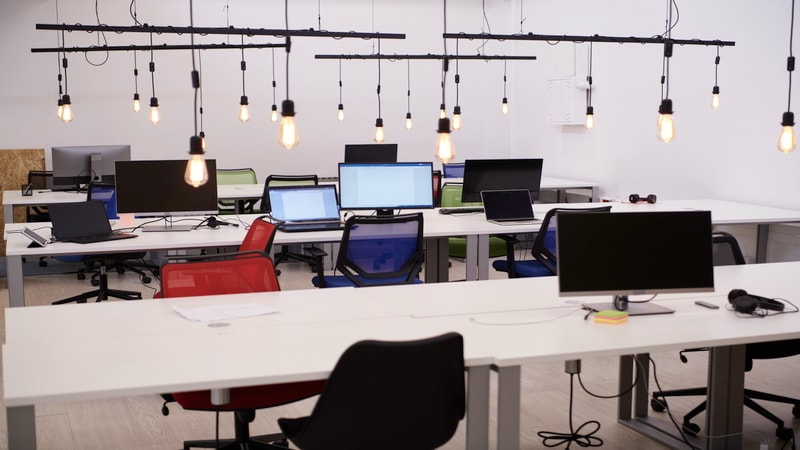 Modern office with hanging E27 LED bulbs 