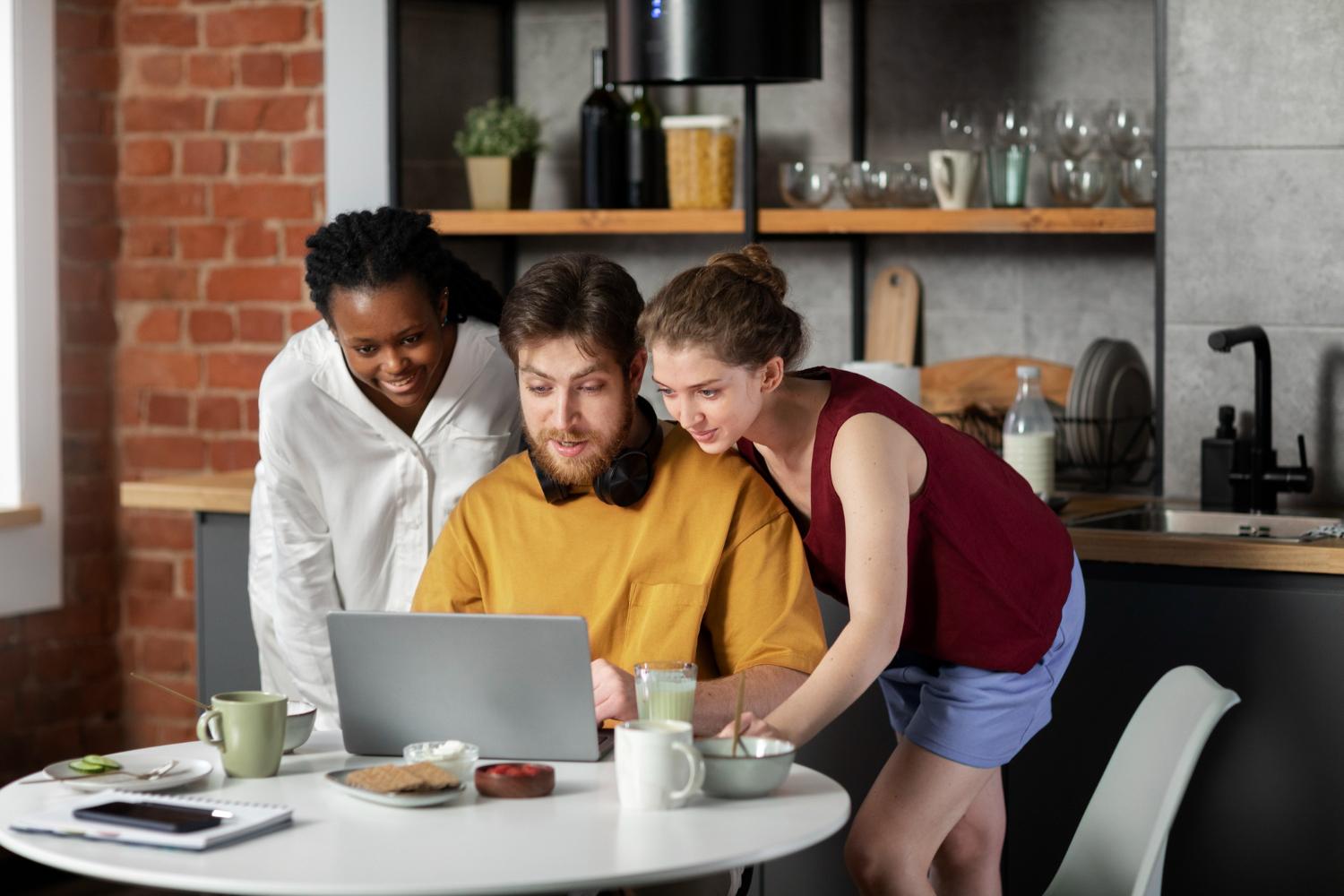 Three people exploring website ideas