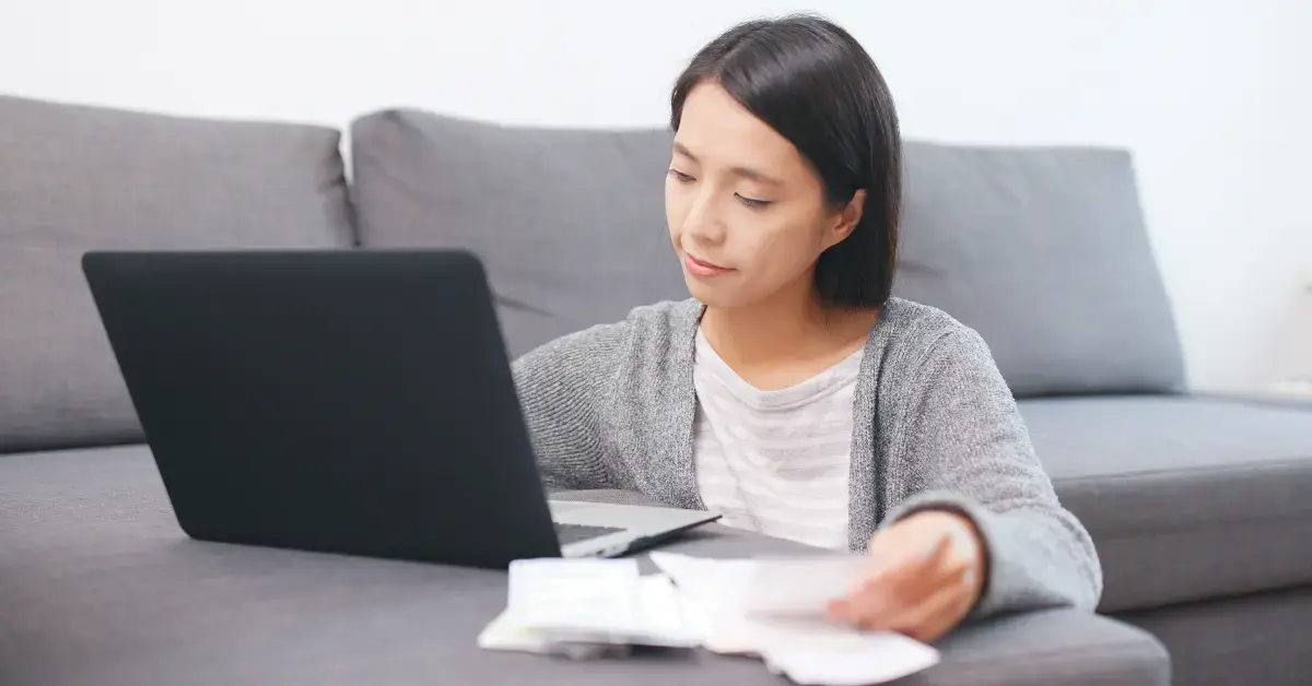 Female creator organizing business expenses and IRS payment plans using Form 9465 instructions.