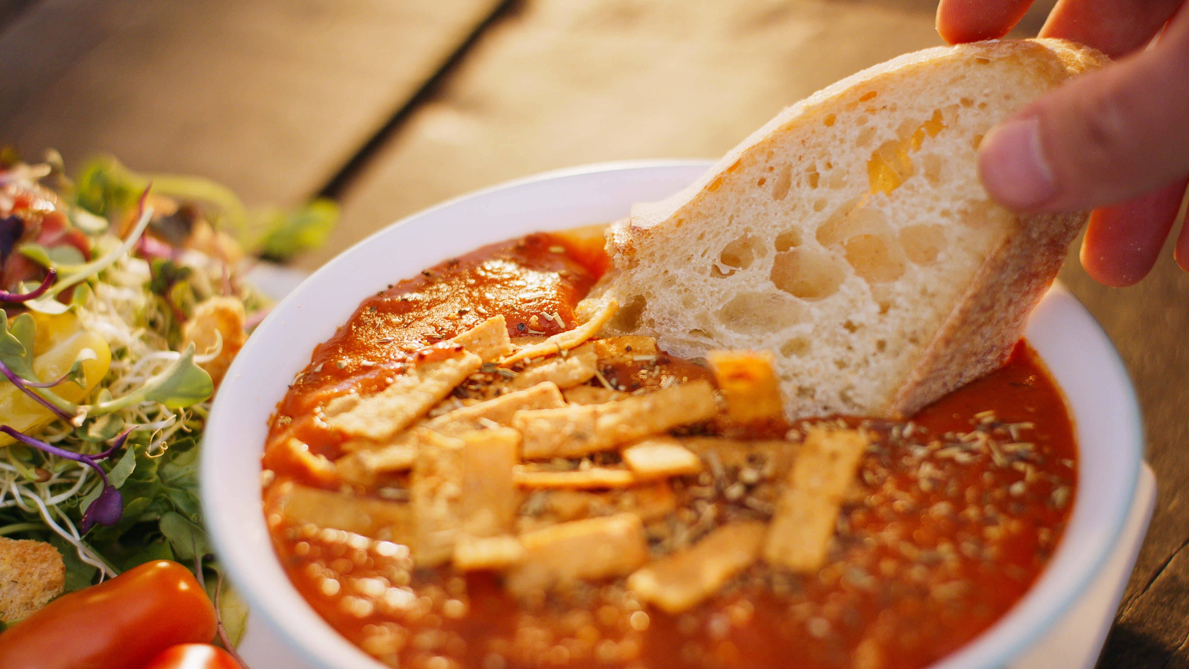 A bowl of keto tomato soup with grilled cheese