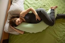 how to use a pregnancy pillow, pregnancy pillows, shaped pillows