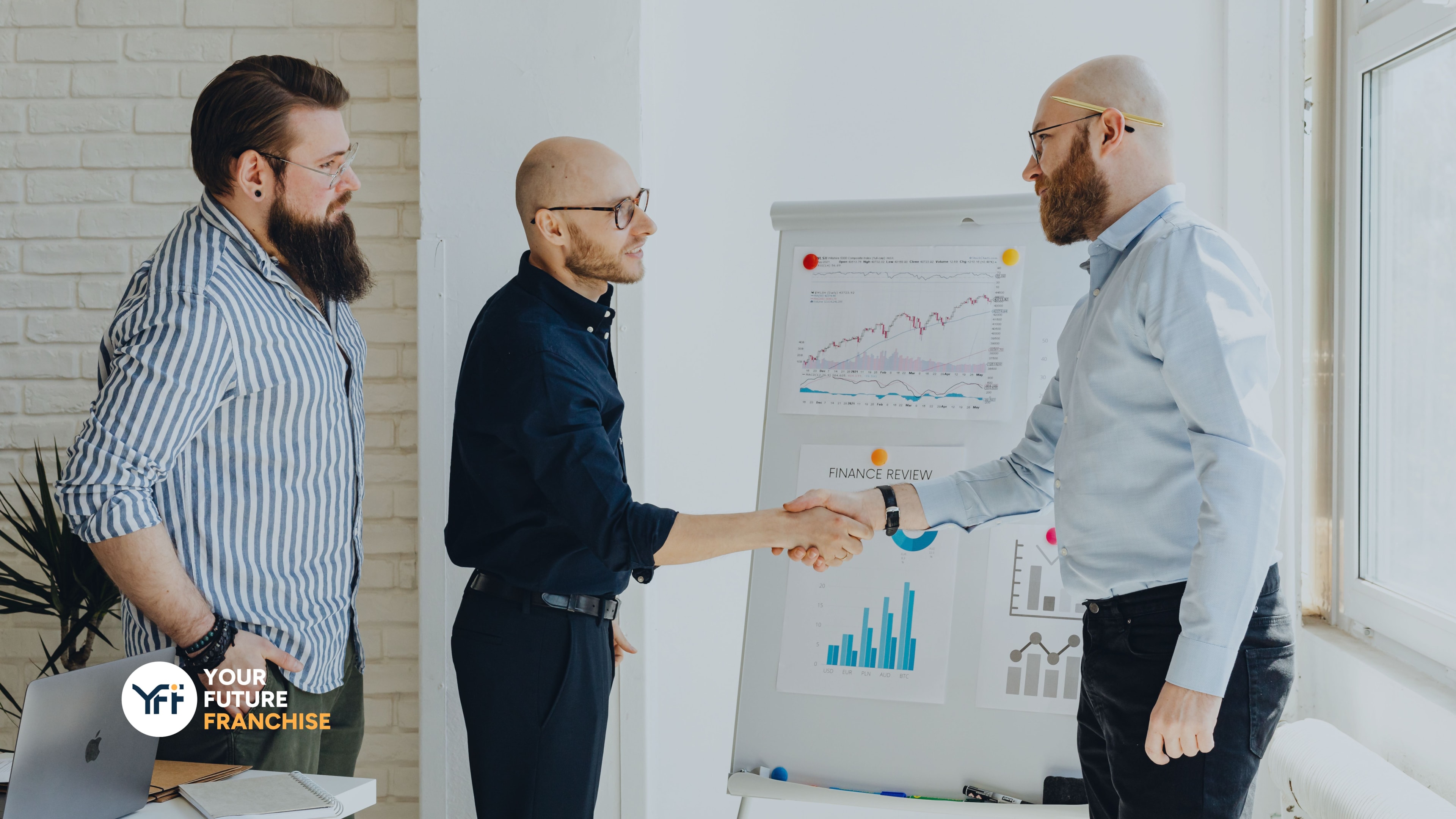 Businessmen chatting and shaking hands about finance projections 