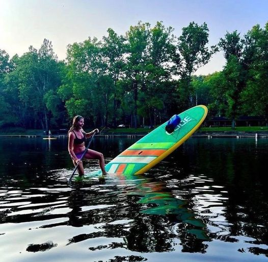 woman on inflatable paddle board