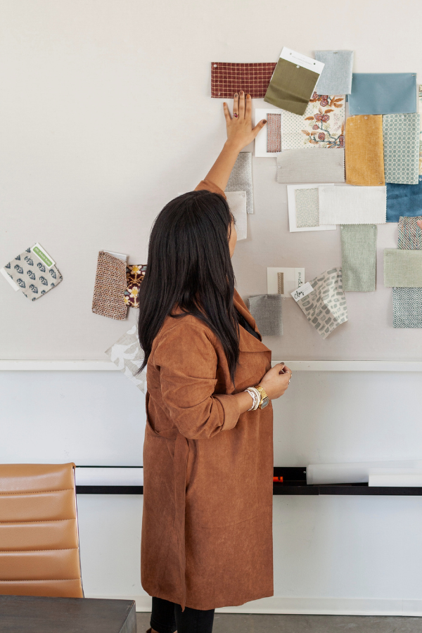 a designer arranging a mood board