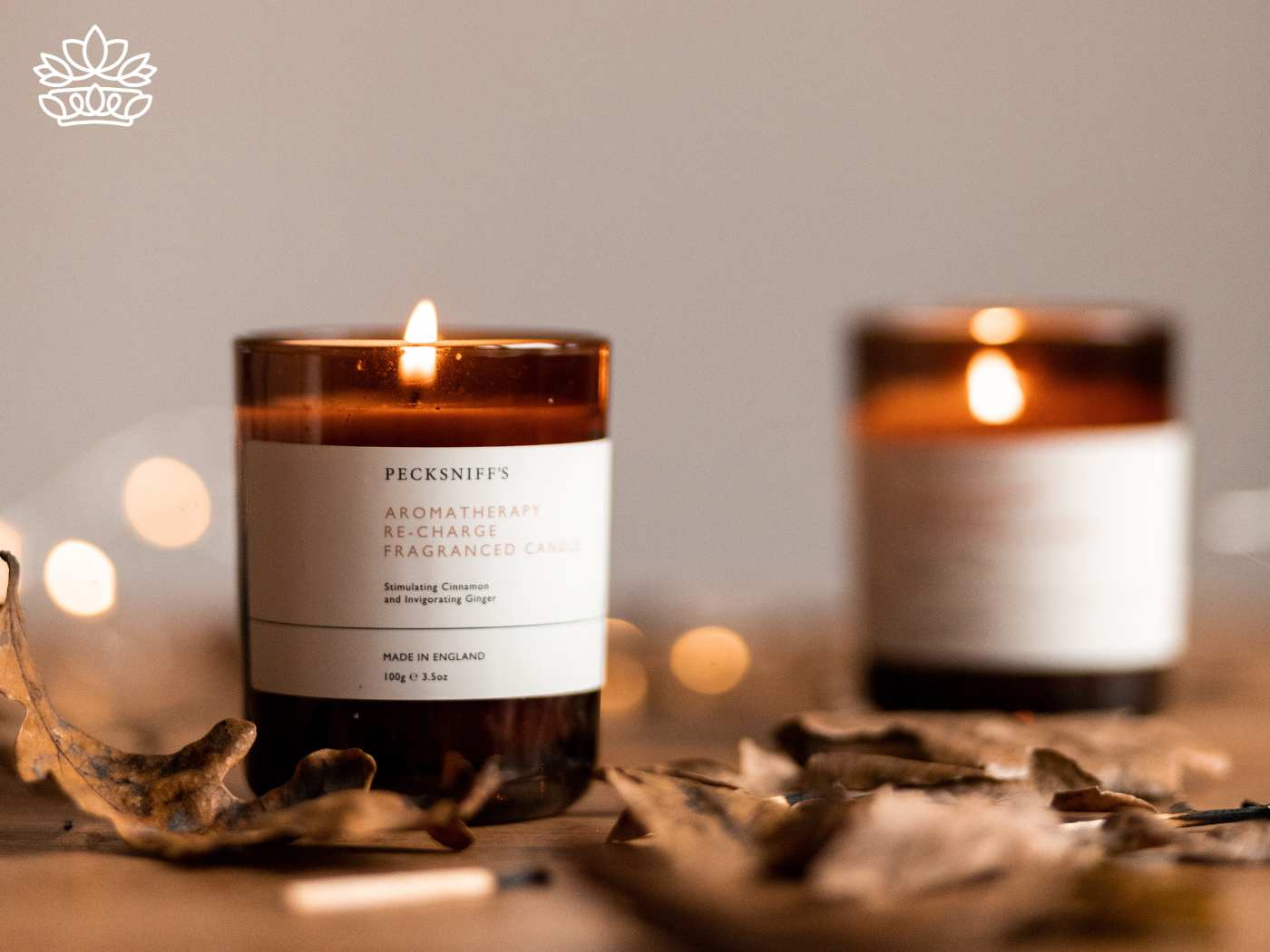 Illuminated aromatherapy candles, a serene addition to any Christmas gift ideas, perfect for a family member to enrich life's moments, alongside gifts for kids and coffee lovers, from the seasonal selection at Fabulous Flowers and Gifts.