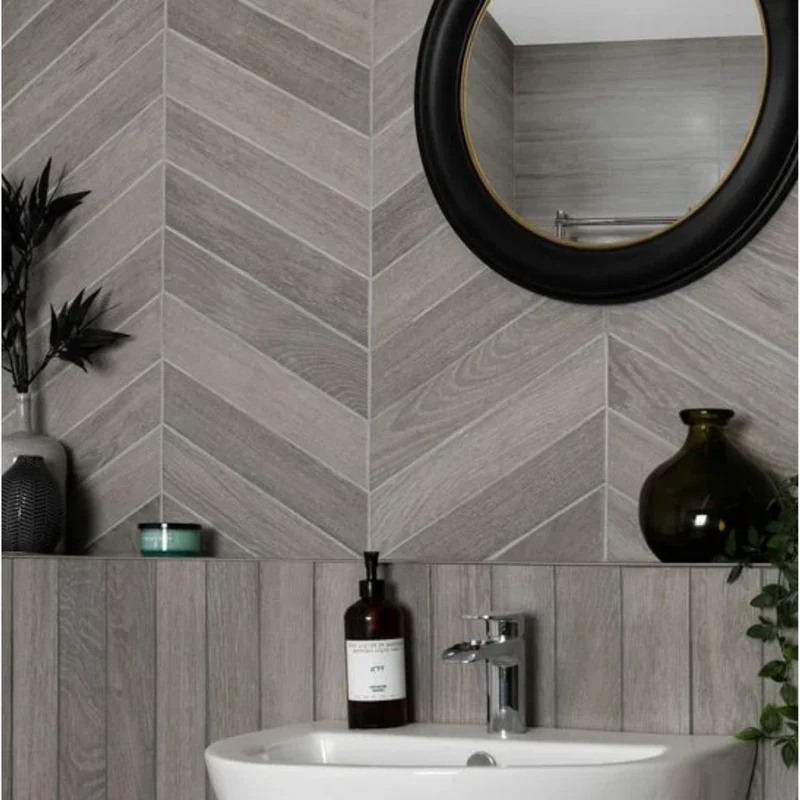 Avana Chevron tile showcasing a bold zigzag design for dynamic bathroom wall layouts.