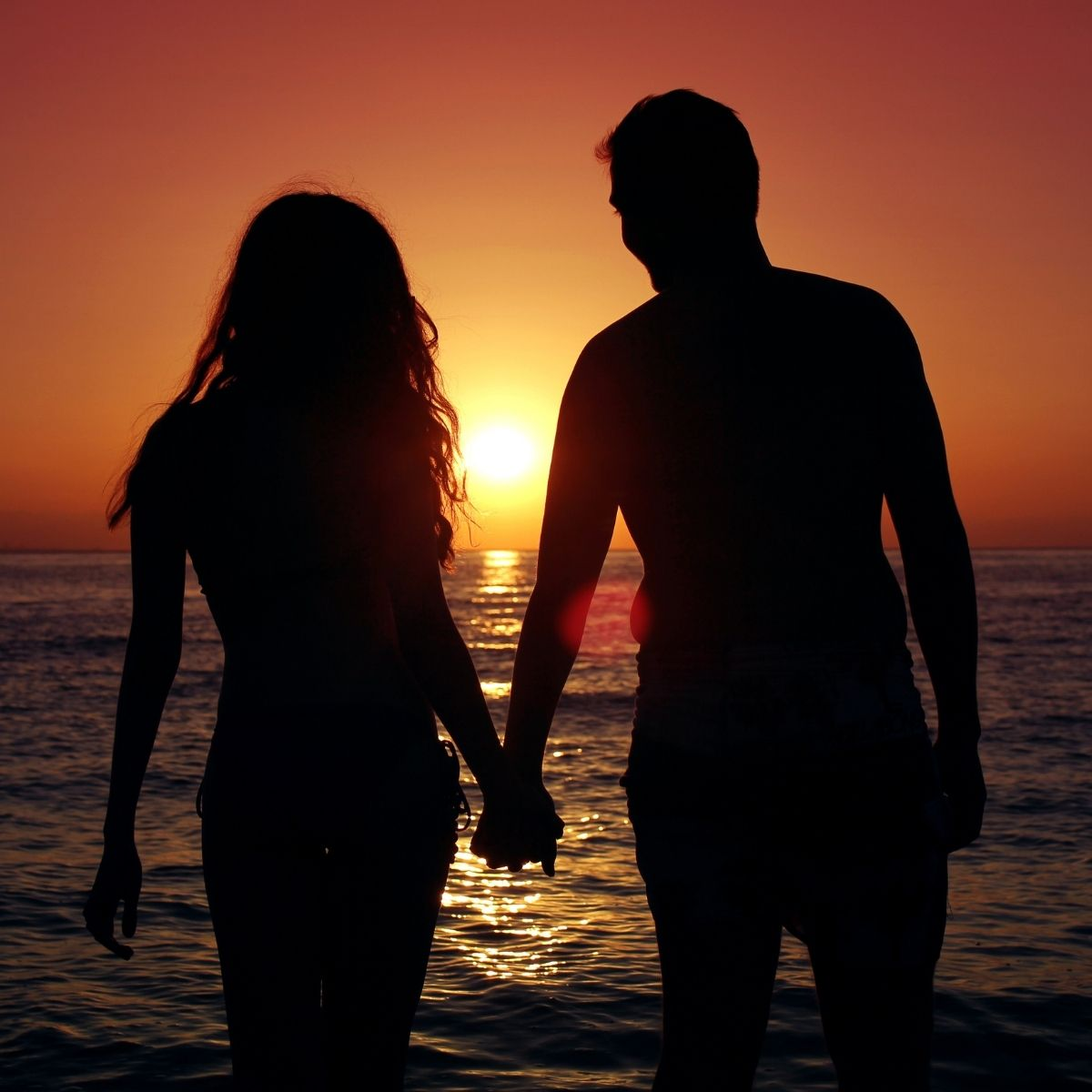 Love, holding hands at sunset: His ideal girl based on zodiac signs