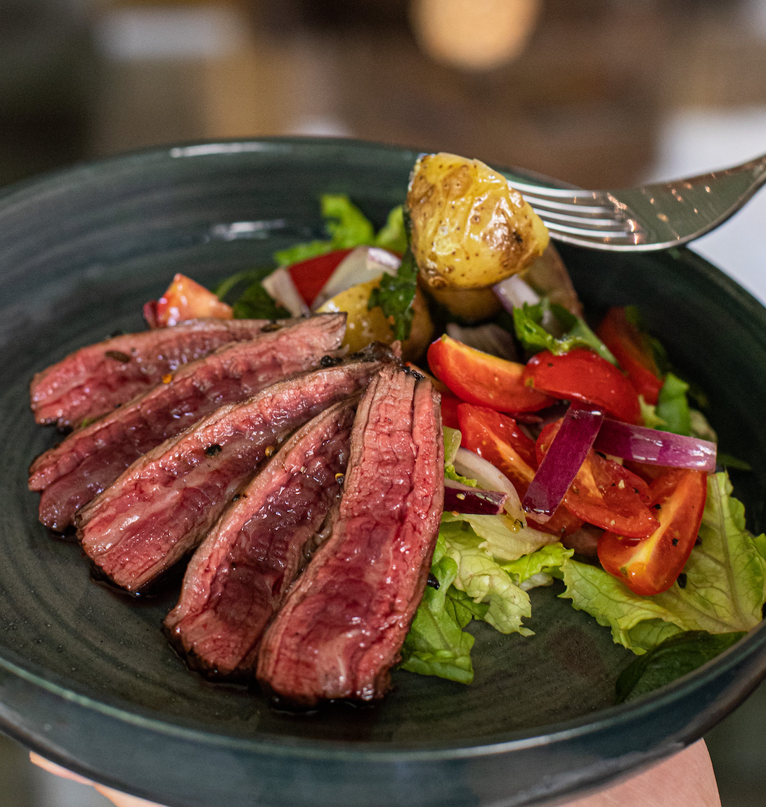 Rest the skirt steak on a cutting board before slicing against the grain. This allows the juices to redistribute yielding deliciously tender meat every time.