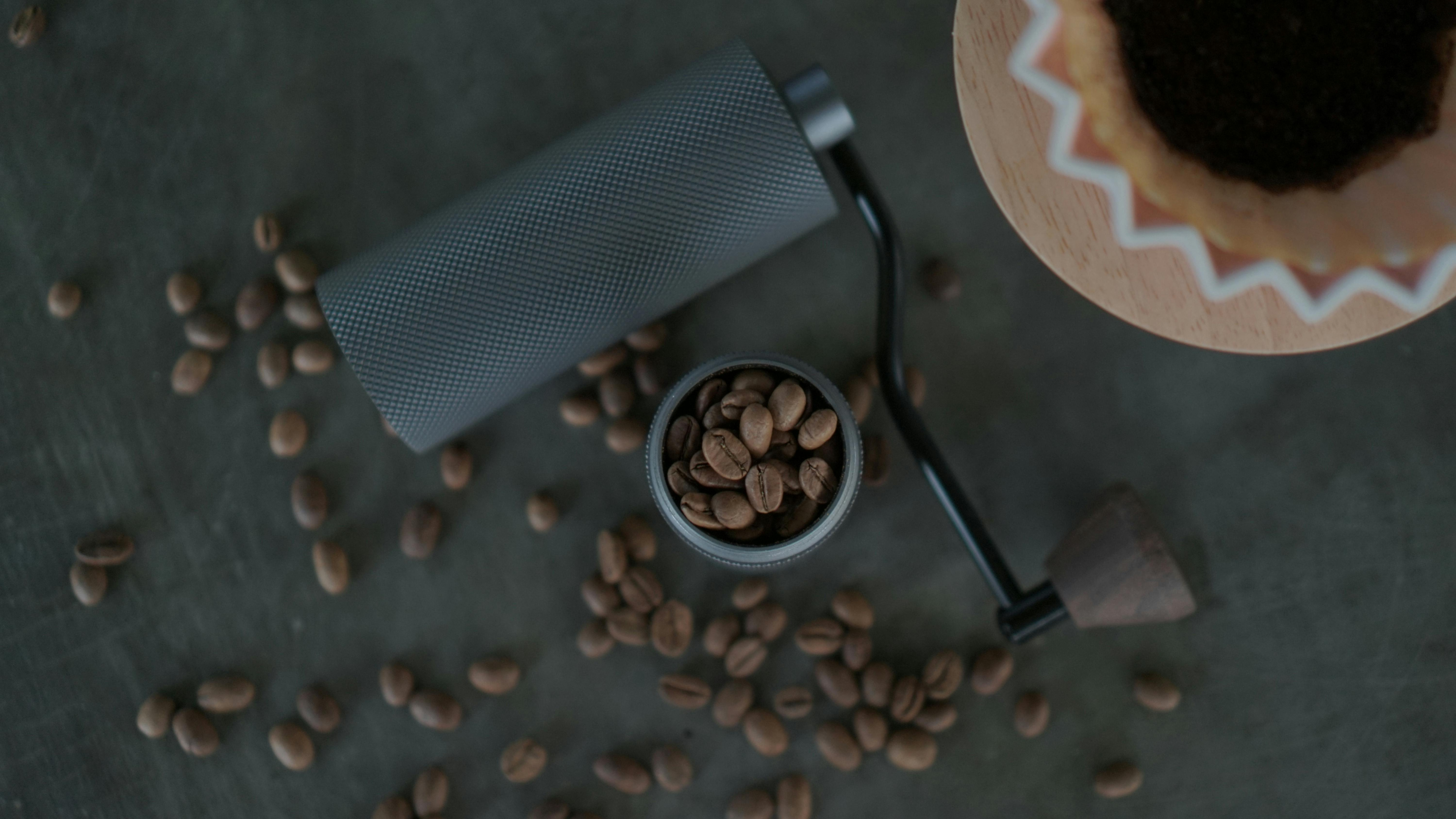 coffee beans in manual grinder