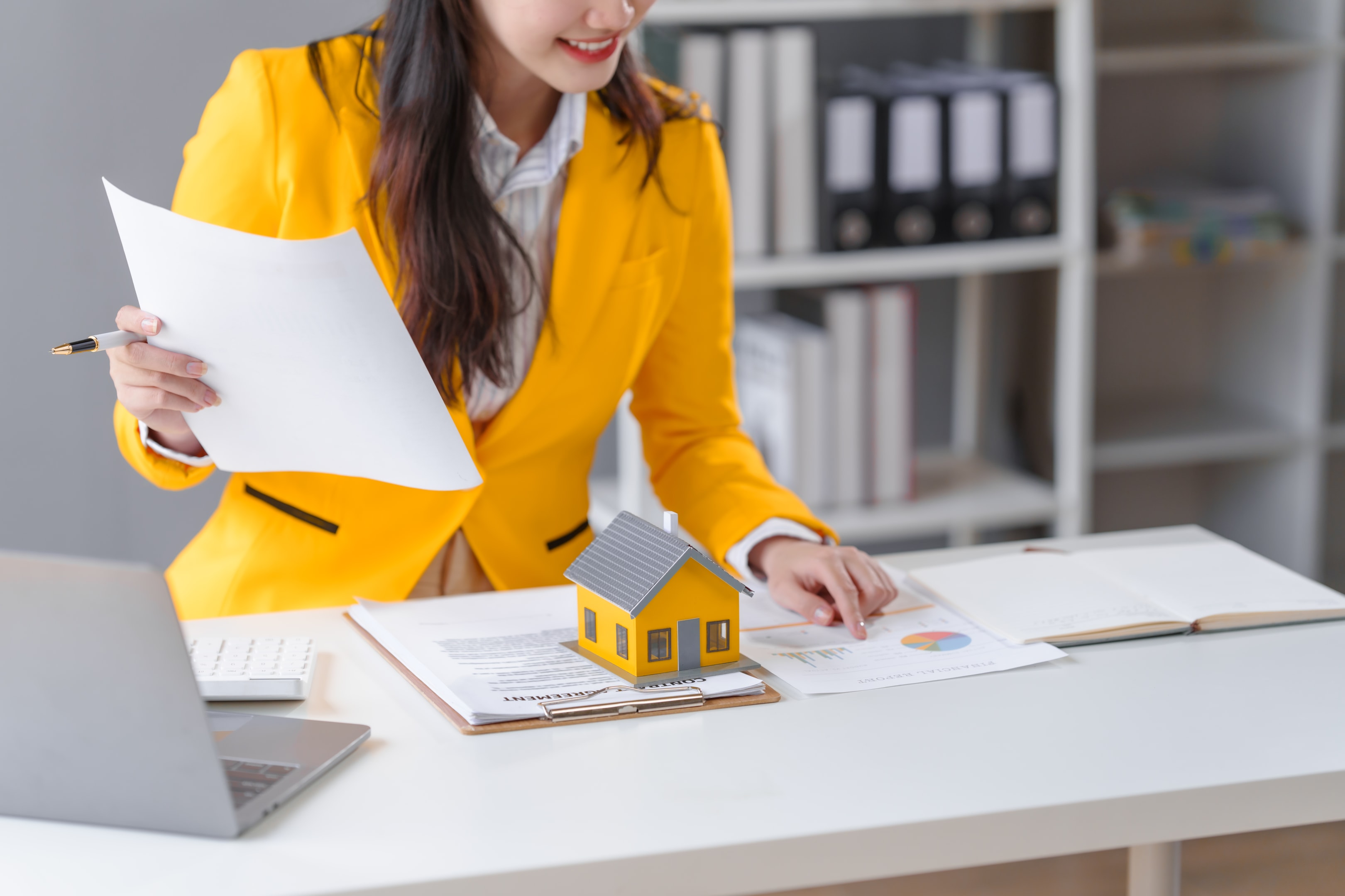 real estate agents and loan providers at work.