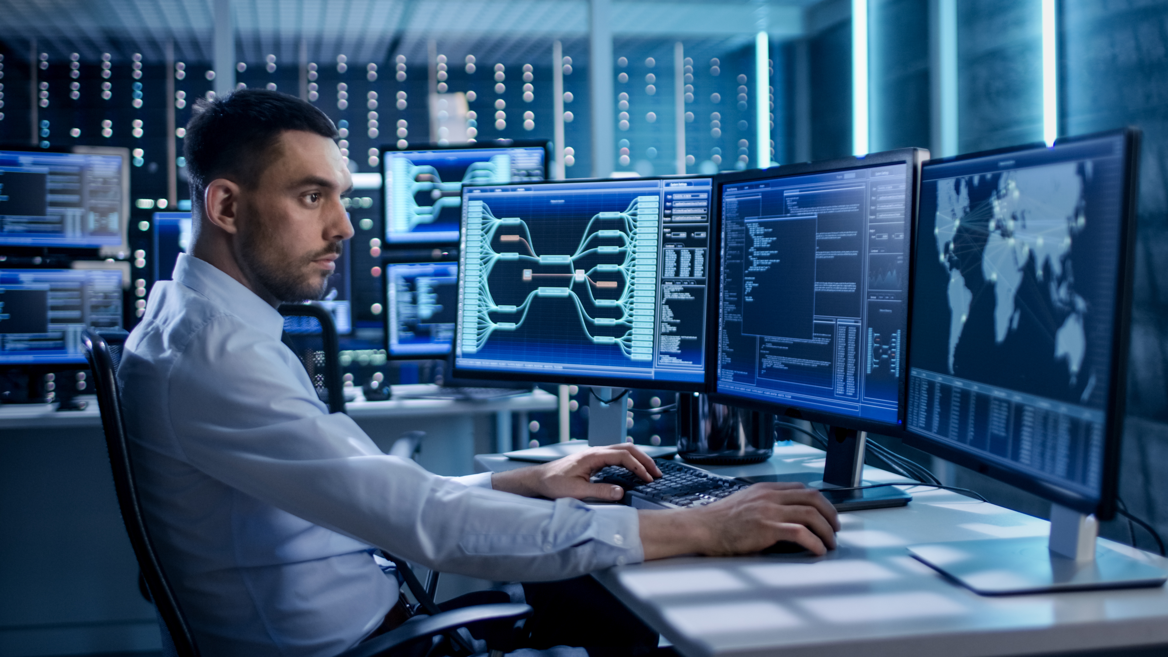 A person looking at a computer screen with a security management system interface