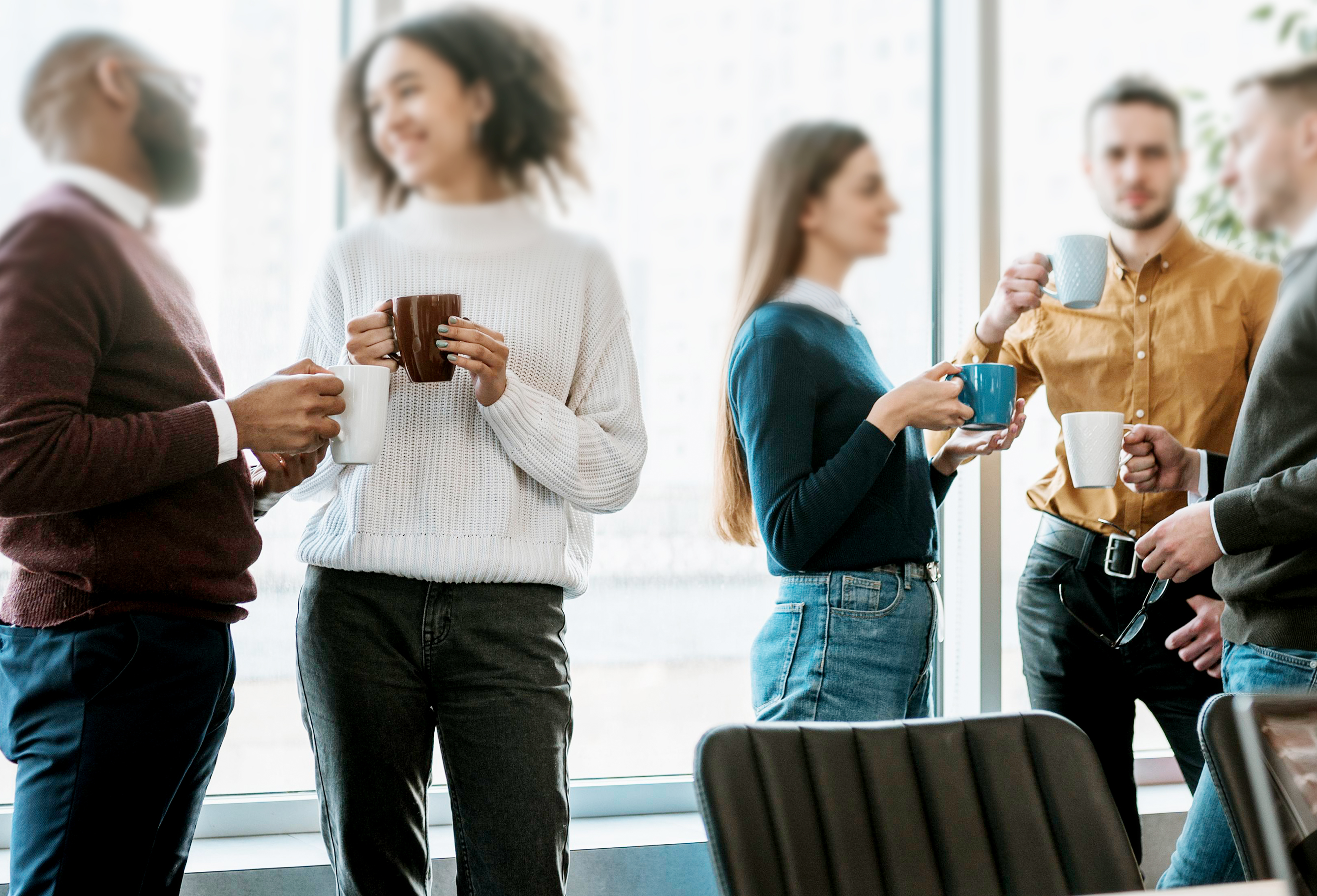 people holding mugs