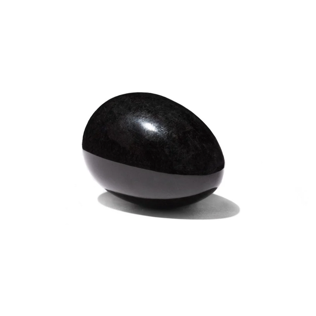 Black nephrite jade eggs carved