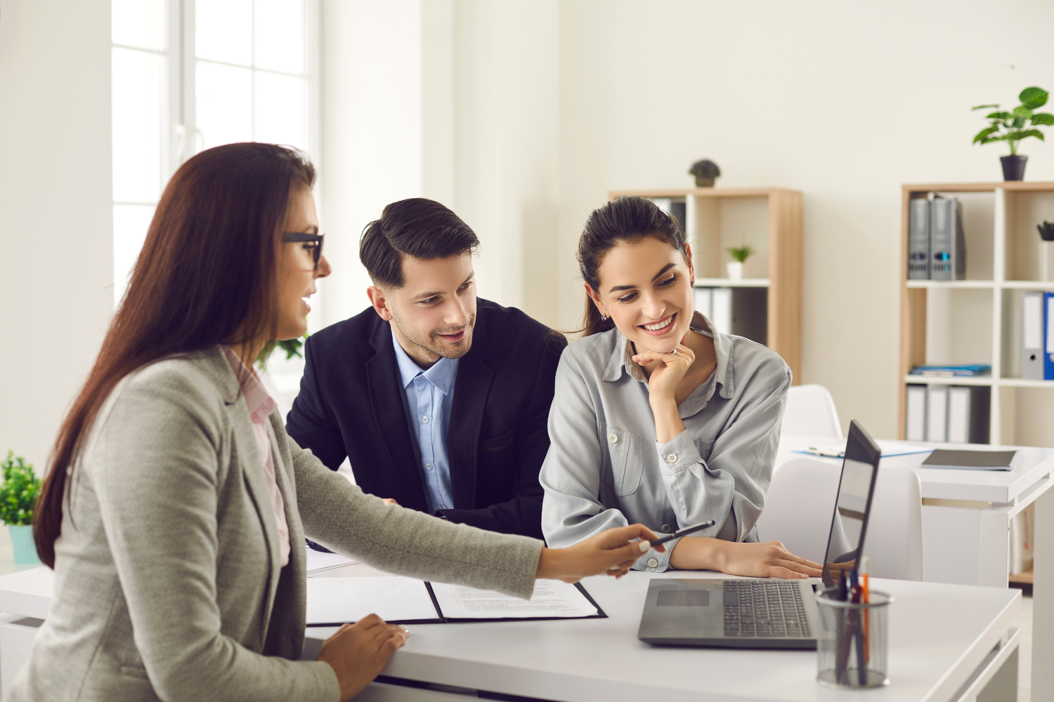 Broker speaking to clients.